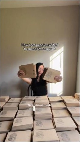 A frame from the creator’s own video, “How I got people excited to spend $9 on my art” (@artsbytrinity, Instagram), cropped to the frame